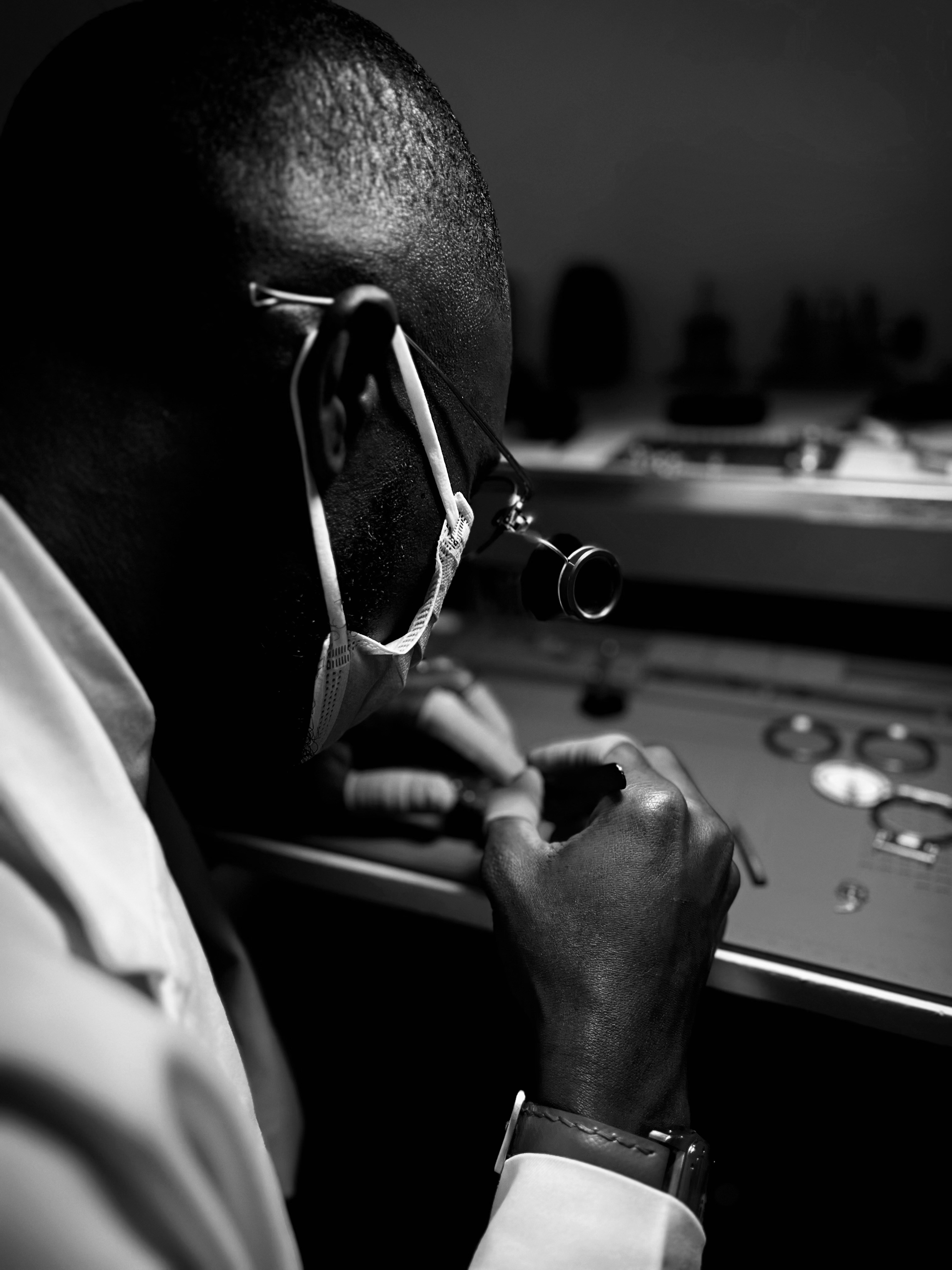 Watchmaker doing a repair in his workshop